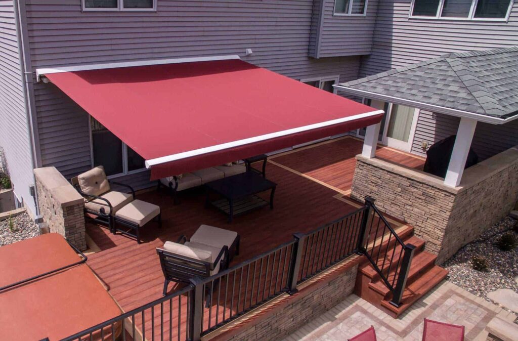 Red Retractable Awning providing shade for a Pennsylvania Deck